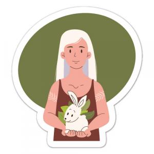 Девушка с зайцем на руках. Забота о животных